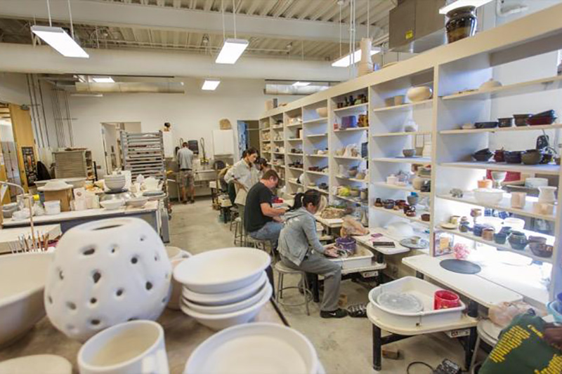 Students work in the ceramics studio