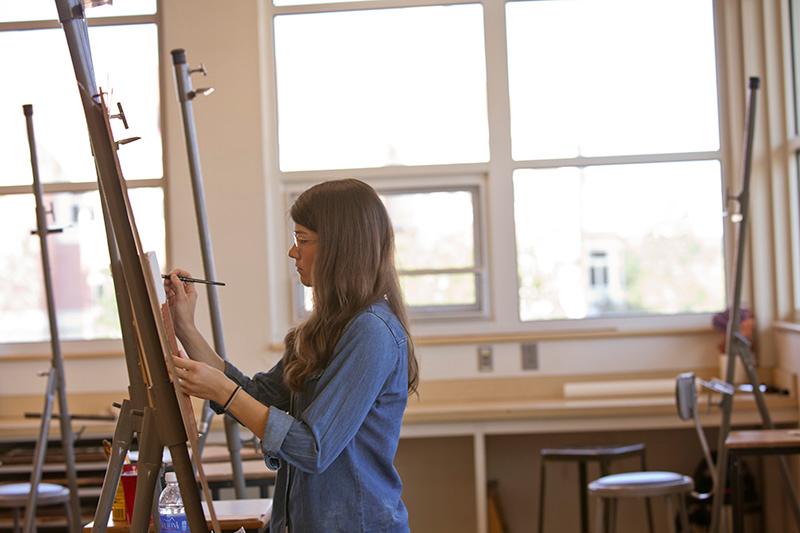 A student paints 
