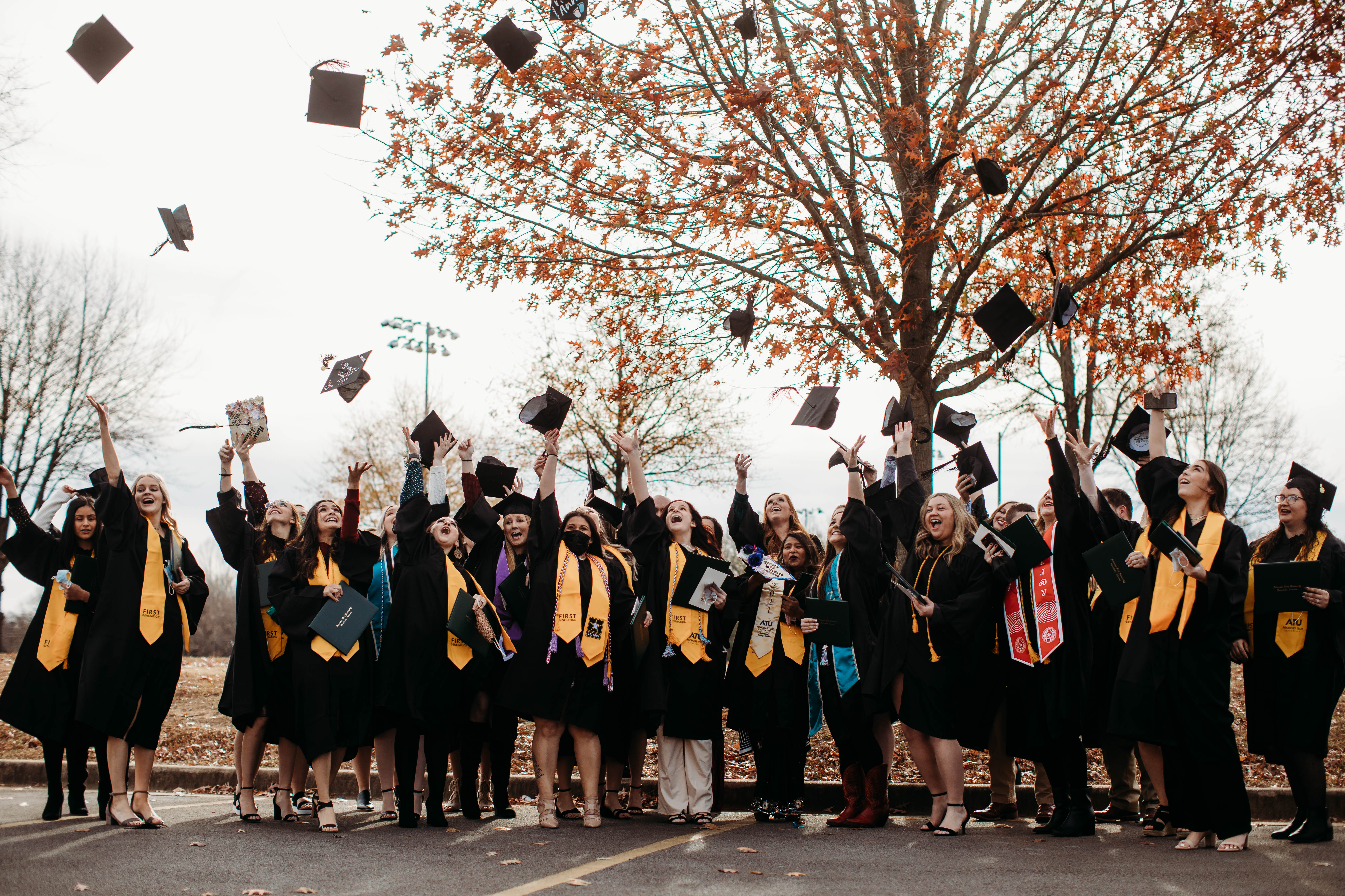 ATU graduates throwing their hats in the air