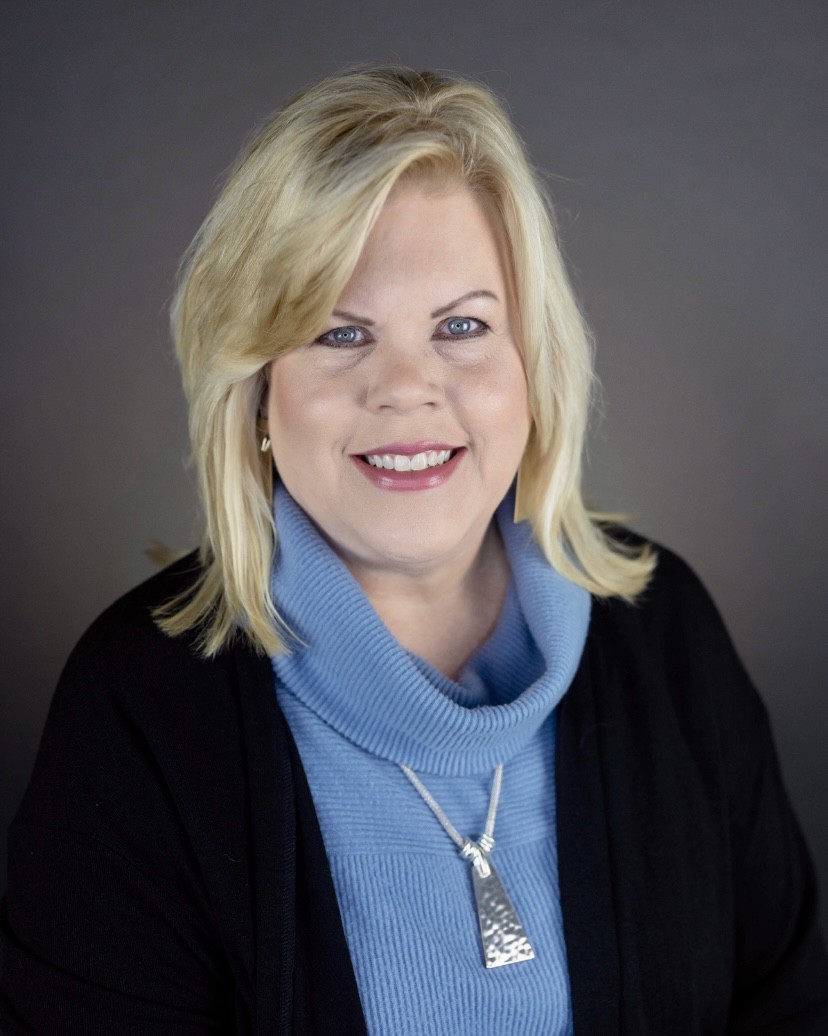 Kim  Tate profile picture.
