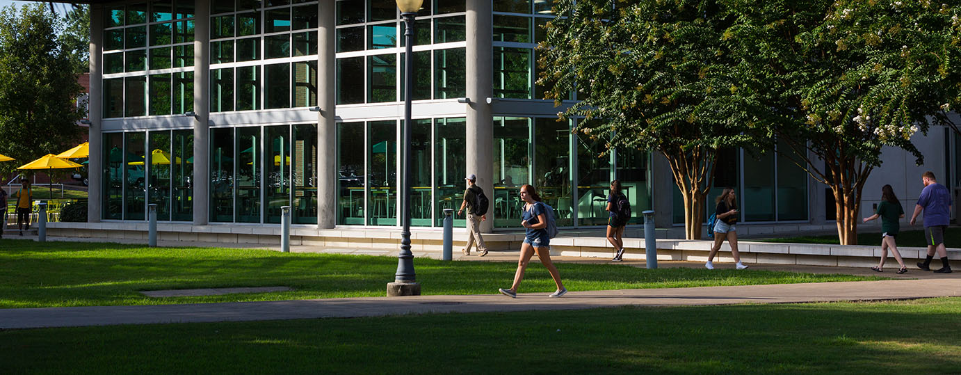 Photo of students walking around Baz-Tech