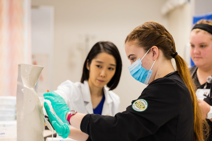 ATU Nursing Student wearing mask and gloves in laboratory setting