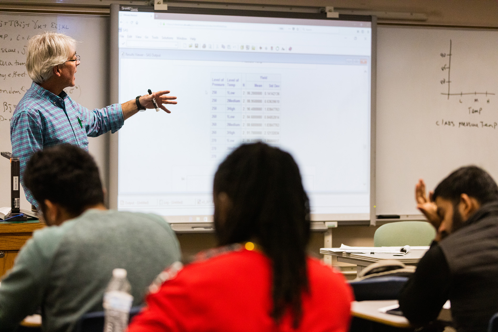 a photo of Dr. Christopher Harris, ATU Choir Director, directing a student choral workshop