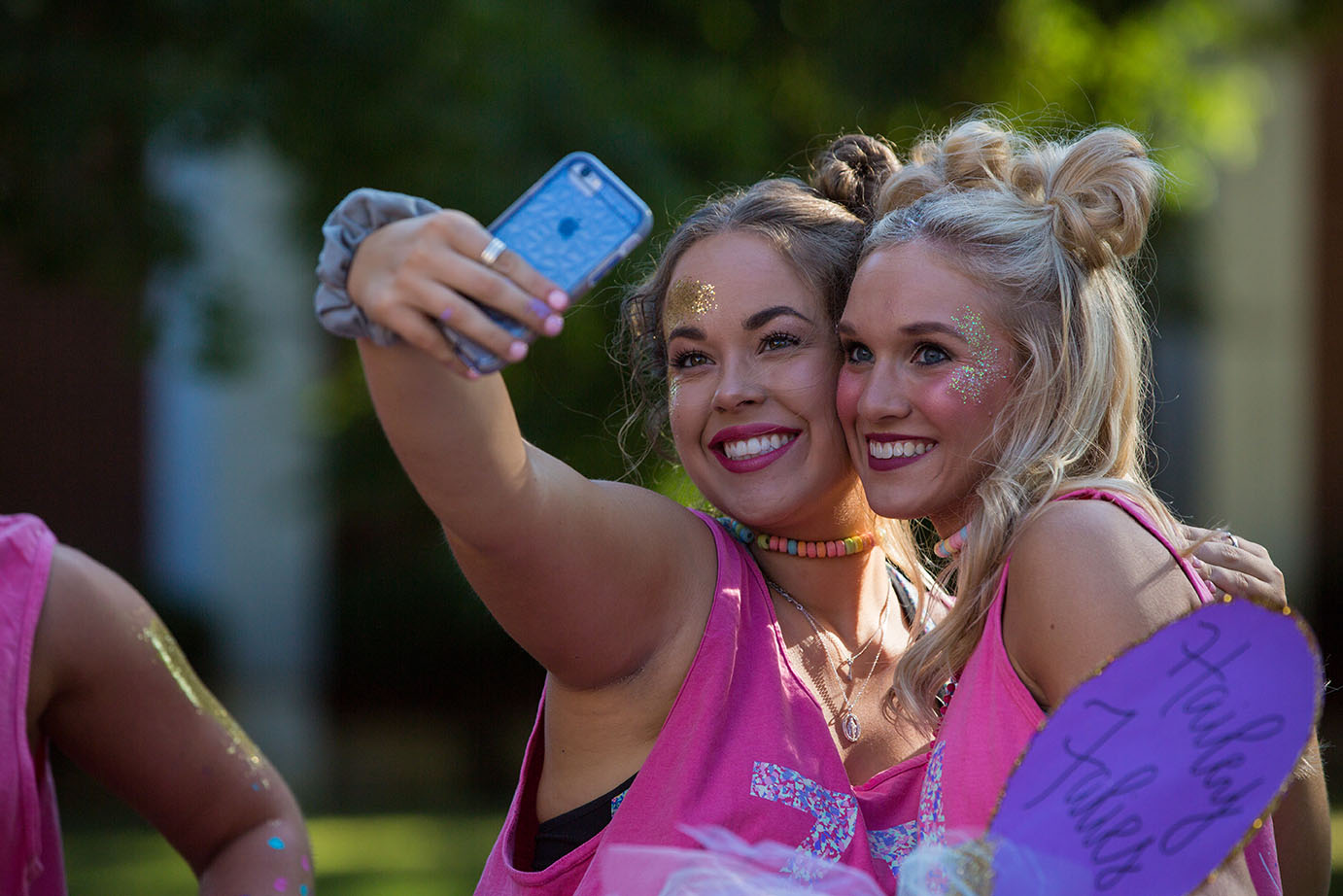 two new sorority members pose for the camera