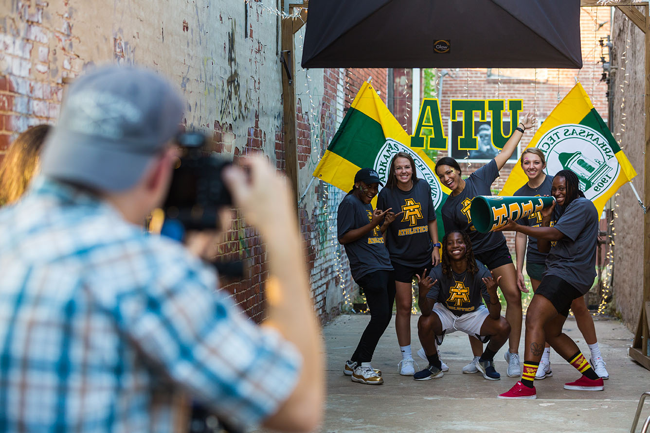 a group of students posing in ATU gear