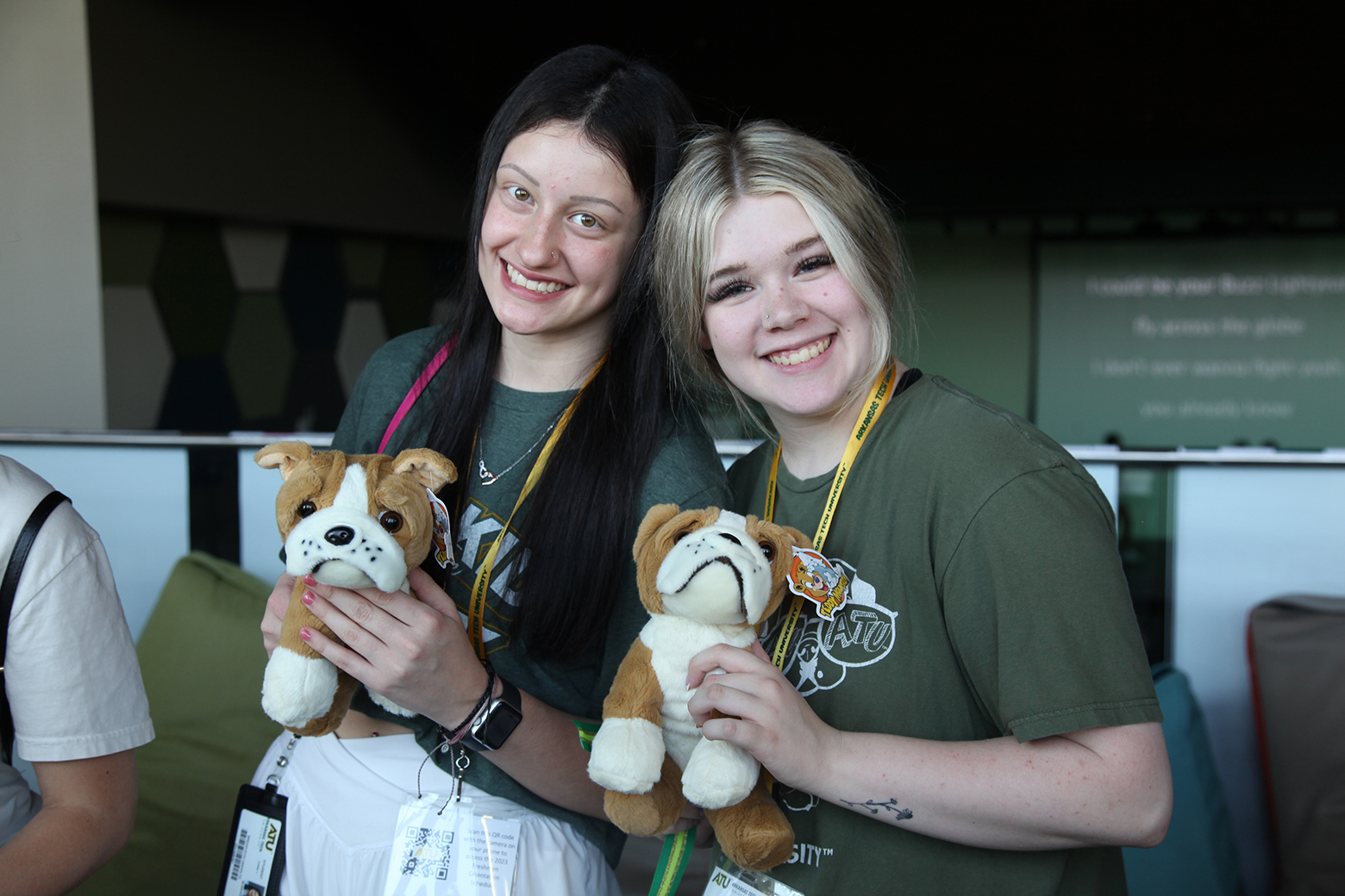 Students smiling with Stuffed Jerry