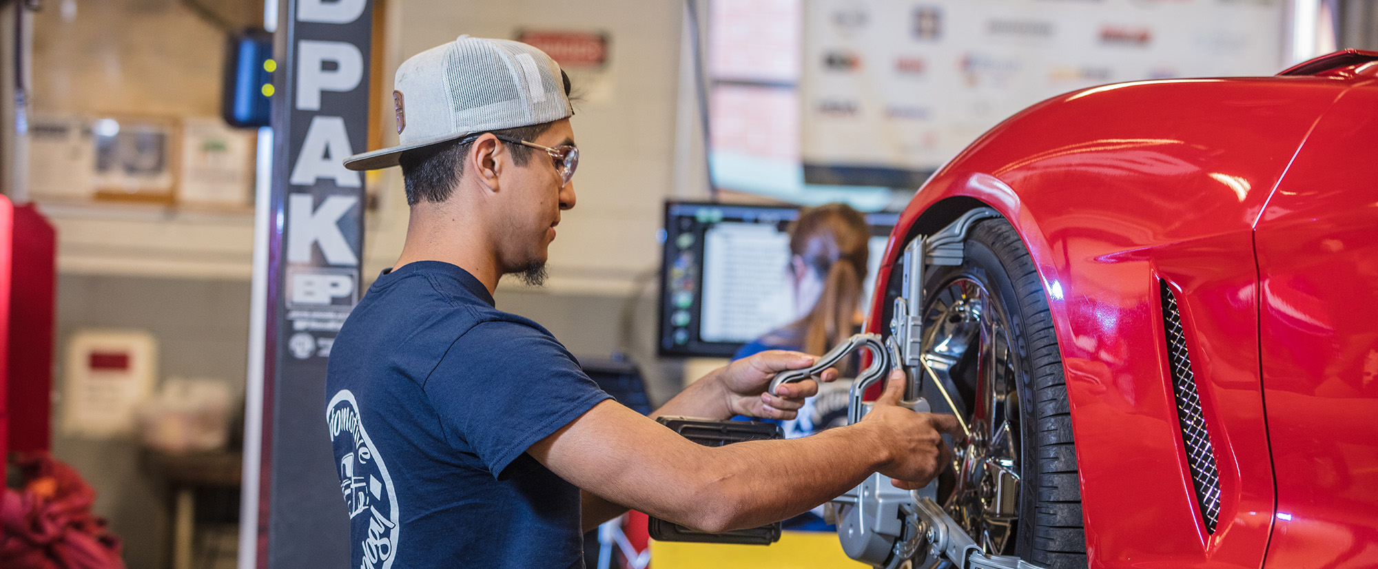 Photo of a student working in the automive lab.