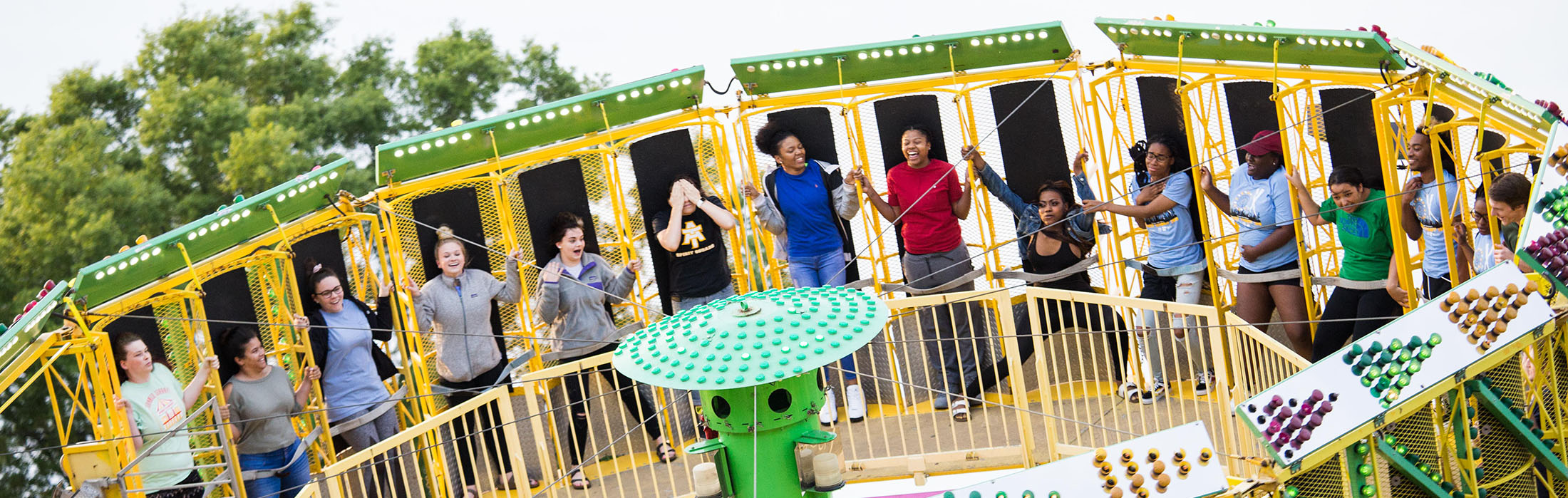 Students enjoy a carnival ride at Summer Send Off 2018