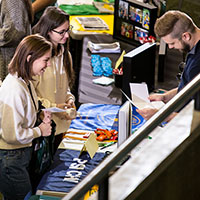 students and parents take a tour of campus