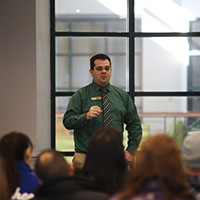 students and parents take a tour of campus