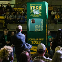 students and parents take a tour of campus