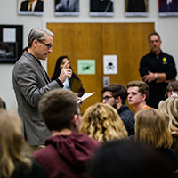 students and parents take a tour of campus